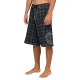 Short de baño Billabong de largo extendido, color negro con diseño a cuadros en tonos grises y blancos, cordón ajustable en la cintura y detalle de logo estampado en la pierna izquierda.
