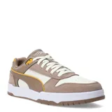 Championes Puma modelo Game Low SD, con diseño retro de bloques de color en tonos beige, crema y detalles en amarillo. Confeccionados con una combinación de gamuza y material sintético, cuentan con plantilla SOFTFOAM+ para mayor amortiguación y suela de goma.