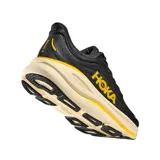 Championes de running Hoka Bondi 9 color negro con suela gruesa en tonos beige y amarillo, y logo de la marca en el lateral.