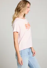 Remera rosa pálido de algodón con cuello redondo y estampado vintage de Bowie en color naranja.