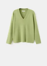 Jersey de punto color verde claro con escote en V y mangas largas.