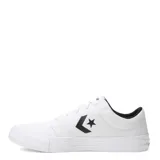 Championes Converse modelo Day One Classic, de corte bajo, confeccionados en lona blanca con detalles en negro. Presentan el logo de la marca en el lateral y suela de goma blanca con textura en la puntera.