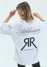 Remerón blanco de jersey de algodón con cuello redondo y mangas cortas. Estampa en delantero y espalda con la palabra 'Athleisure' y el logo de la marca.