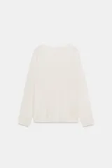 Jersey de punto fino con diseño de rayas horizontales en azul marino y blanco, cuello redondo y manga larga con corte raglán.