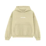 Hoodie de corte oversize en color beige, confeccionado en tela de felpa suave. Presenta capucha, bolsillo frontal tipo canguro y un diseño bordado en el centro del pecho.