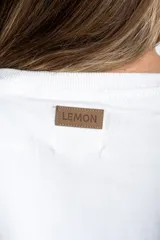 Remerón negro de algodón con elastano, de manga larga, cuello redondo y corte recto.