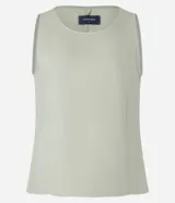 Blusa sin mangas de sarga color verde claro, con escote redondo y diseño liso.