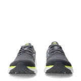 Championes de running New Balance Evoz con tecnología Fresh Foam en la entresuela. Presentan un diseño en color gris oscuro con detalles en verde neón y blanco, confeccionados en malla transpirable con el logo N característico en los laterales.