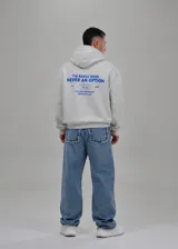 Hoodie gris melange con capucha, de corte boxy fit amplio, con estampado azul en la espalda con la inscripción "The basics were never an option".