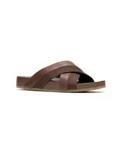 Sandalias de hombre con diseño de tiras cruzadas en combinación de cuero y tejido textil, con suela plana de goma.