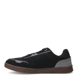 Championes urbanos Caterpillar modelo Pause Retro Canvas, color negro con detalles en gris. Confeccionados en una combinación de lona resistente y gamuza, con suela de goma color marrón con textura hexagonal y logo de la marca en el lateral y la suela.