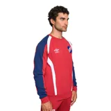 Buzo deportivo de cuello redondo marca Umbro, perteneciente al Club Nacional de Football. Presenta un diseño en tonos azul claro y azul oscuro con detalles en blanco, incluyendo el logo de la marca y el escudo del club bordados en el pecho.