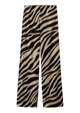 Pantalón largo de viscosa con estampado animal print tipo cebra en tonos beige y negro, de corte recto y holgado.