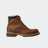 Bota de cuero Timberland de caña media, con diseño impermeable, cuello acolchado en tono oscuro, cierre de cordones y suela de goma dentada.