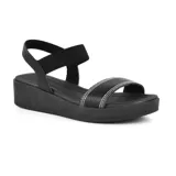 Sandalias azules de cuero con plataforma baja y tiras anchas.