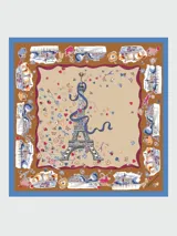 Pañuelo de seda 50x50 cm, modelo Tour Enchantée de Longchamp, con estampado colorido sobre fondo blanco y azul que ilustra motivos parisinos como la Torre Eiffel, abejas y elementos icónicos de la marca.