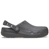 Zuecos Crocs Classic Crafted Clog color gris, con capellada de lona textil y suela de goma Croslite. Incluye tira pivotante en el talón.