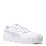 Championes Puma modelo Carina 3.0, de diseño inspirado en los años 80 con plataforma. Presentan una base blanca con detalles en lila suave en el lateral y logo de la marca en dorado.