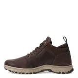 Botas de caña media Caterpillar, confeccionadas en cuero marrón con detalles en gamuza. Presentan cordones jaspeados, suela de goma en color beige con diseño dentado y logo de la marca grabado en el lateral y la lengüeta.
