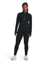 Remera deportiva de manga larga para mujer, color negro, con cuello alto y cierre frontal parcial. Presenta aberturas para los pulgares en los puños.