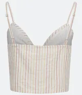 Musculosa cropped de algodón a rayas verticales color crema y dorado, con tirantes finos ajustables y escote corazón con nudo.