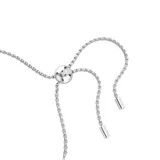 Pulsera plateada de eslabones con circonias blancas engarzadas, con cierre corredizo ajustable.