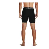 Calza deportiva corta Under Armour modelo HeatGear Compression, color negro con cintura elástica ancha gris y logo de la marca estampado en blanco en la pierna derecha.