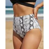 Conjunto de bikini de dos piezas de la marca Uniteduy, compuesto por un crop top amarillo liso con diseño cruzado y tirantes finos, y una bombacha de tiro alto con estampado floral y de hojas en tonos amarillos, verdes y blancos.