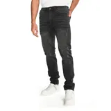 Pantalón de jean corte skinny color gris oscuro con efecto desgastado, diseño de cinco bolsillos, cierre de cremallera y botón metálico con logo de la marca.
