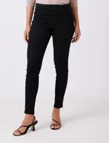 Jegging de algodón marca Sound Style, color negro, con bolsillos simulados en la parte delantera y bolsillos aplicados en la trasera. Modelo skinny de tiro alto.