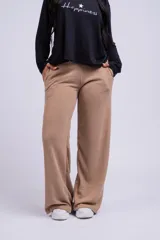 Pantalón palazzo acampanado color beige, de tejido acanalado.