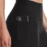 Calza capri Under Armour HeatGear negra con logo en la pierna izquierda.