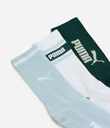 Pack de tres pares de medias de caña larga marca Puma, confeccionadas en algodón suave y respirable. El set incluye un par celeste, un par blanco con detalles en verde y un par verde oscuro, todos con el logo de la marca estampado.