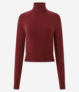 Blusa de punto de la marca Blue Steel, con cuello alto y manga larga. Diseño básico de corte ajustado, confeccionado en tejido de punto suave.