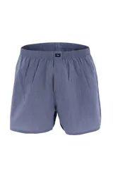 Calzoncillo tipo bóxer de tela con estampado de cuadros en tonos rojo y azul marino, con cintura elástica.