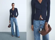 Pantalón jeans de tiro alto y corte wide leg, confeccionado en tejido de algodón con elasticidad. Presenta diseño de cinco bolsillos, cierre frontal con botón y cremallera, y trabillas para cinturón.