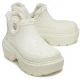 Botas Crocs modelo Stomp Lined Shorty, color negro, con plataforma alta, diseño de caña baja con aberturas laterales y forro interno de corderito sintético.