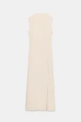 Vestido midi verde lima, sin mangas, con escote corazón y bajo evasé.