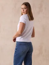 Buzo tejido en hilado fino color naranja, marca Ninety.