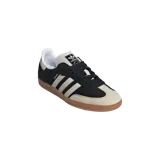 Championes Adidas modelo Samba OG, color negro con detalles en blanco y suela de goma marrón.