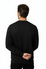 Buzo negro de cuello redondo con el texto "MAN EDITION" estampado en el pecho, de manga larga con puños elastizados y diseño liso.