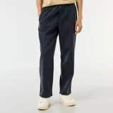 Pantalón azul marino de corte recto y holgado, con cintura elástica con cordón ajustable.