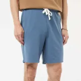 Bermudas de chándal de corte estándar, confeccionadas en tejido de muletón, con cintura elástica y bolsillos laterales.