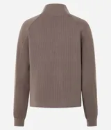 Buzo de corte regular confeccionado en mezcla de poliéster, viscosa y elastano. Presenta cuello alto estructurado, mangas largas con corte raglán y puños ajustados.