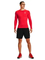 Remera de compresión Under Armour HeatGear de manga larga, color rojo con logo blanco en el pecho. Ideal para entrenamiento.