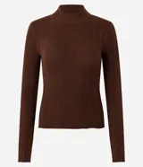 Blusa de punto de manga larga con cuello alto y diseño acanalado, confeccionada en una mezcla de viscosa y poliamida.