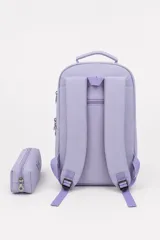 Mochila Paris de poliéster color rosado, con compartimentos múltiples con cierre y cartuchera pequeña a juego.