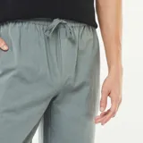 Pantalón de mezcla de lino color verde, de corte recto.