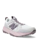 Championes de trail running New Balance modelo Tektrel, con diseño en tonos blanco, lila y rosado. Presentan una combinación de malla transpirable y refuerzos sintéticos, con el logo N en el lateral y suela dentada AT Tread para mayor tracción.