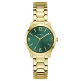 Reloj analógico Guess modelo Winni con caja y malla de acero inoxidable en tono dorado. Presenta una esfera de 34 mm en color verde con acabado sunray, números arábigos en las posiciones 3, 6, 9 y 12, y manecillas doradas.